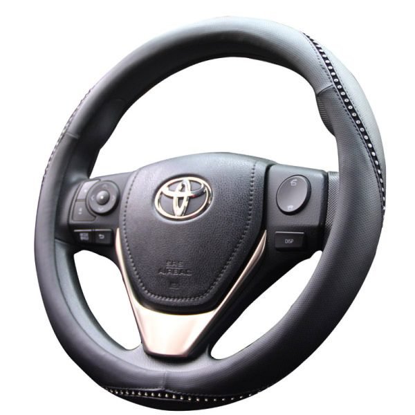 Angled view of bling steering wheel cover with sparkling rhinestone trim for cars