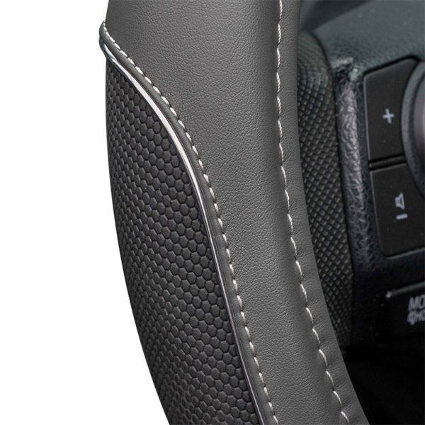 Close-up of PU leather deluxe car steering wheel cover stitching