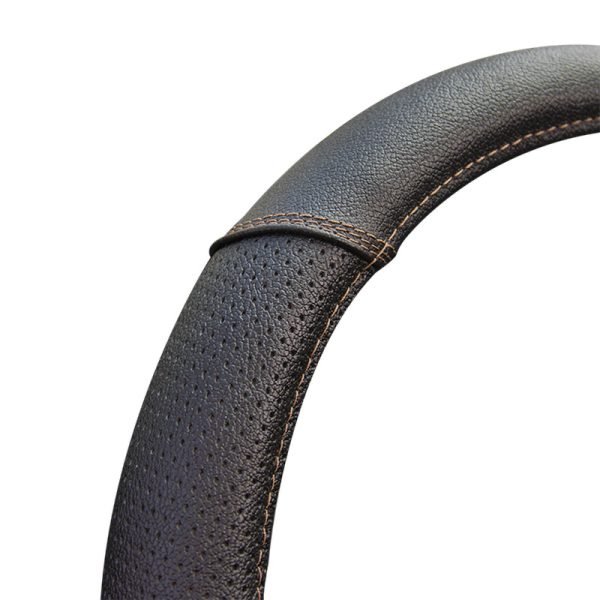 Close-up of leather steering wheel cover stitching and texture