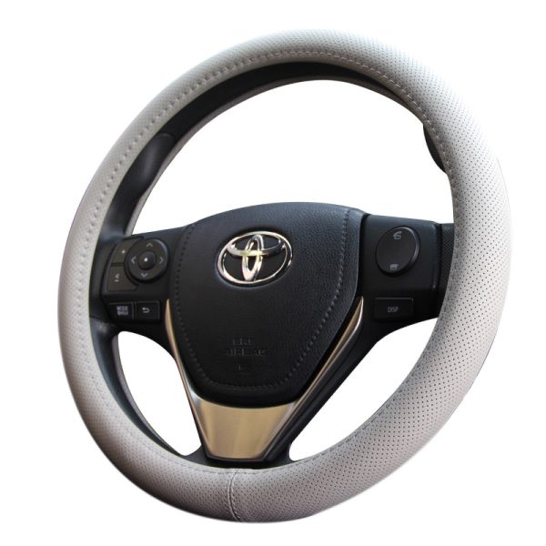 Universal beige perforated leather wheel cover angled view