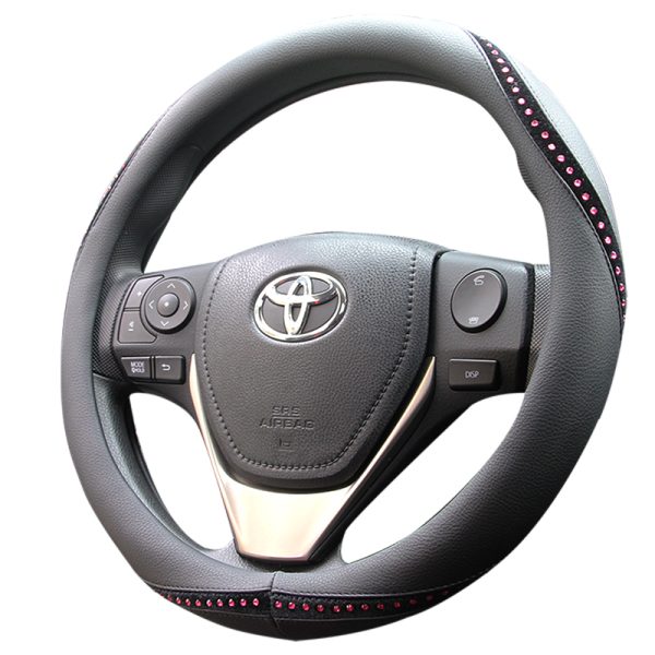Stylish rhinestone car steering wheel cover with pink gems – angled view