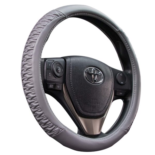 Shrink gray steering wheel cover with textured grip design