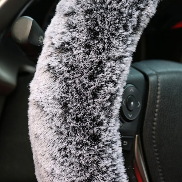 plush teddy bear steering wheel cover texture close-up