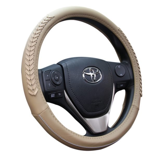 Unique steering wheel cover in beige PU leather with braided stitching