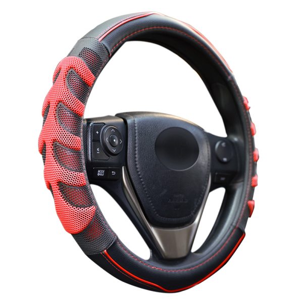 Red and black 3D honeycomb steering wheel cover installed on car steering wheel