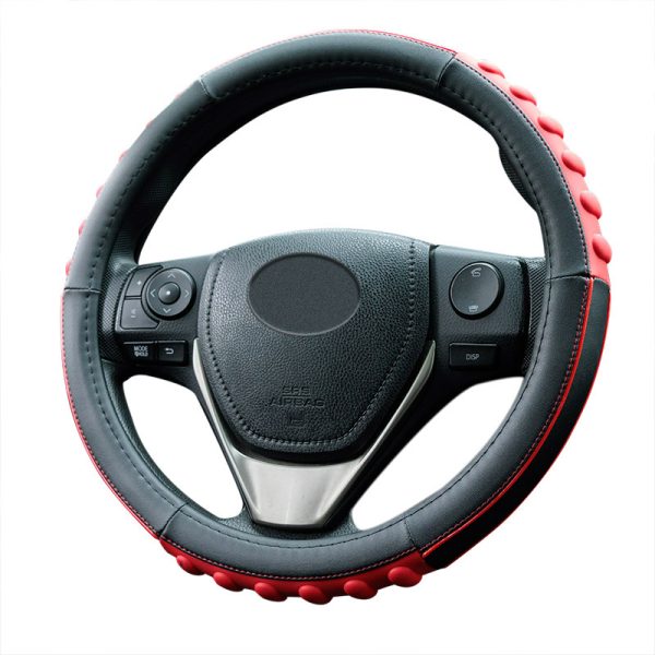 Front view of red and black 3D massage steering wheel cover 80627 on a steering wheel