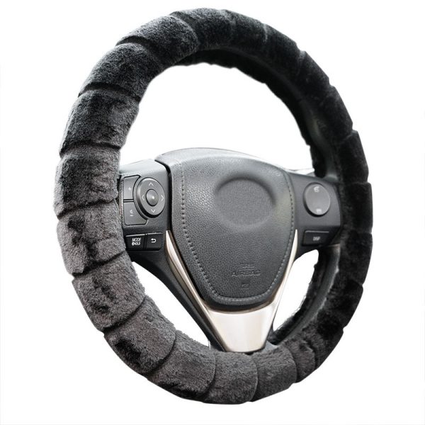 Front view of a short plush steering wheel cover with segmented panels on a steering wheel